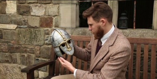 Tom Rowsell examines a replica of an Anglo-Saxon helmet