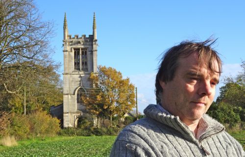 Tim Hankins helps maintain All Saints Church in Aldwincle, England. Poet John Dryden was born in Aldwincle and baptized in the church. (Photo: Patrick Cox)
